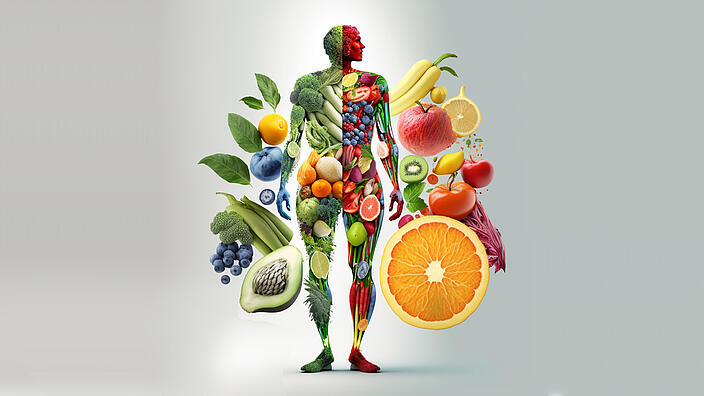 Eine Person (Silhouette) bestehend zur Hälfte aus Gemüse und zur anderen Hälfte aus Obst 